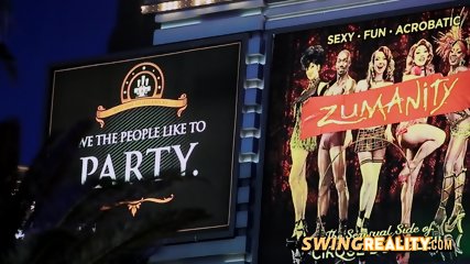 Open minded swinger couples are having a wild orgy in the red room.