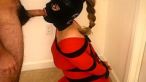 Latex Hood Strapped And Bound Blowjob