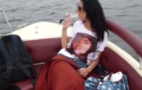 Amateur brunette smokes on a yacht and gives a nice blowjob