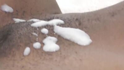 Young black hottie ravaged by a big white dick and sprayed with cum