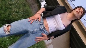 Public Wetting! Tranny girl walks through the city with piss-filled jeans!