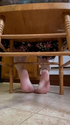 Under the kitchen chair and floor POV