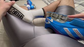1st person view guy jerks off in shiny sportswear and sneakers using sock as cock ring