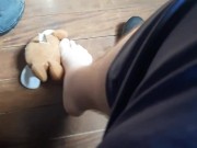 Stepping on the teddy bear with my sneakers
