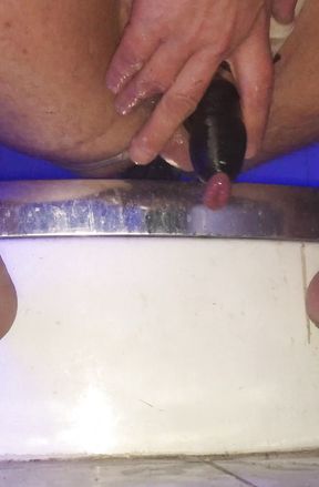 Sissy in chastity fuck ass with massive black dildo