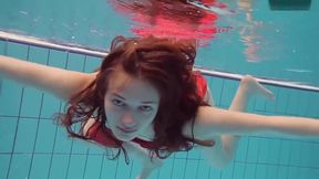 Red Dressed teen 18+ Swimming With Her Eyes Opened