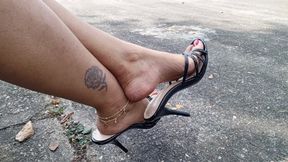 Very pronounced arches on crossed feet and high heels (3)