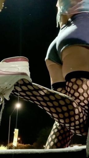 Sexy ass tight jean shorts and fishnets on outdoor display hot sissy TS
