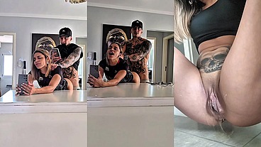 Intense fucking in front of the mirror ends with jets of semen and squirt at the end.