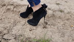 dirty high heels boots, high heels stuck, high heels sinks in ground, boots wrecked