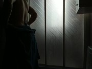 Boy performs striptease in slow motion while whipping. Produce sound waves