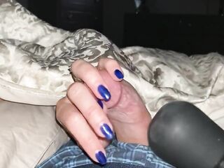Teasing and edging him with a fleshly tugjob to completion. Bright blue fingernails on schlong