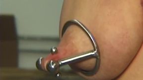Redhead MILF Submits to Weighted Nipple Clamps