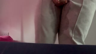 Sitting on floor trying to hold my pee potty dancing until soaking sweatpants