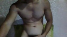 Muscular Asian Guy Showing Off His Chest