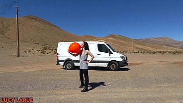 "Vanlifer Blows Up A Giant Orange Balloon in the Desert"