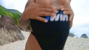 breastfeeding on the deserted beach