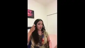 Indian woman takes on a big black cock, moaning as she rides it.