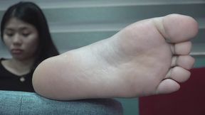 Close up view of Wei Wei's soles