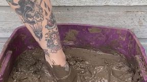 Black heels, long toes in mud