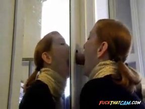 Redhead Amateur Couple's Gloryhole Blowjob