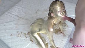 Beauty in gold paint sucks cock and fucks in different poses