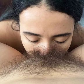 Sucking her delicious hairy pussy