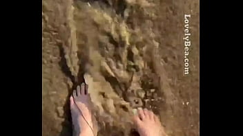 Washing off my beautiful Feet at sandy beach Lovely Bea