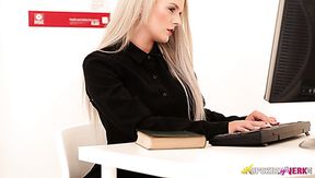 Serious looking office nympho Dolly P flashes her upskirt in the office