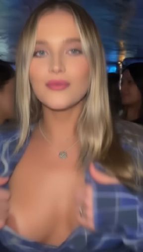 titty drop, a young, blonde Caucasian woman with, video created by AI