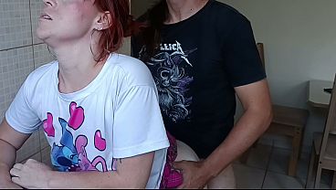 Hot redhead gets fucked in the kitchen by her stepbrother while washing the dishes