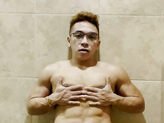 Hot Asian guy playing his nipples and jerk off his massive load!