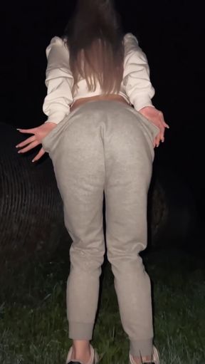 Solo blonde teen spreads her ass in a strip club