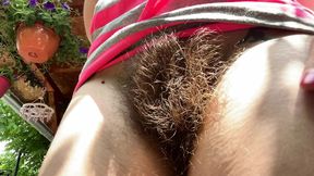 Smoking two cigarettes outside closeup big hairy bush