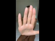 Hand blocks view but legs stay spread wide 💦
