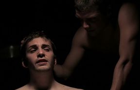 Wade Warren in a dark room with his friend Tyler Casson