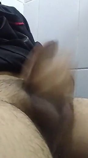 Young Man in the Public Bathroom