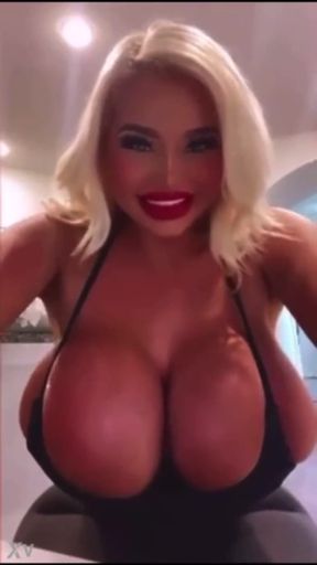 Bimbo with huge tits gets her tit worshipped