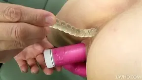 Horny Natsumi Mitsu gets her pussy and ass dildoed