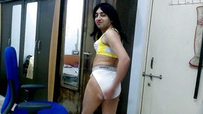 Dirty sissy crossdresser femboy Sweet Lollipop in a sports bra and thong.