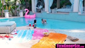 Petite teen dykes lick each other's pussy at the pool