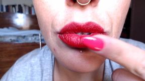 smearing my lipstick around my lips