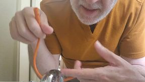 stuffguy #11 was going to simply jerk off but then decided to take a piss and use the catheter to get off.