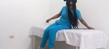 My nurse massages her pussy and moans with pleasure in her office