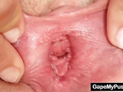 Blonde Lilith Lee pulling and spreading pussy lips