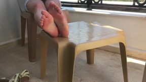 Feet And Pussy Showing. She Plays With Feet And Pussy On A Public Balcony