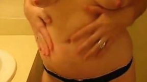 Anonymous busty chick poses on webcam in her bathroom
