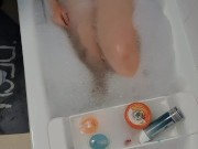 BBW gets golden shower while having a bath.