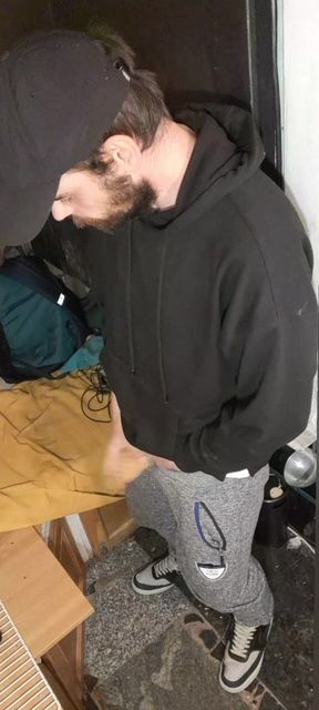 I Masturbate in Sweatpants, a Black Sweatshirt and Nike Sneakers