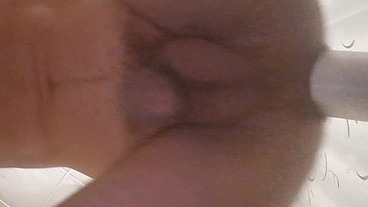 I'm hammering a bottle that's inside my ass hole
